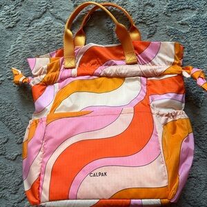 calpak groovy orange lunch bag
